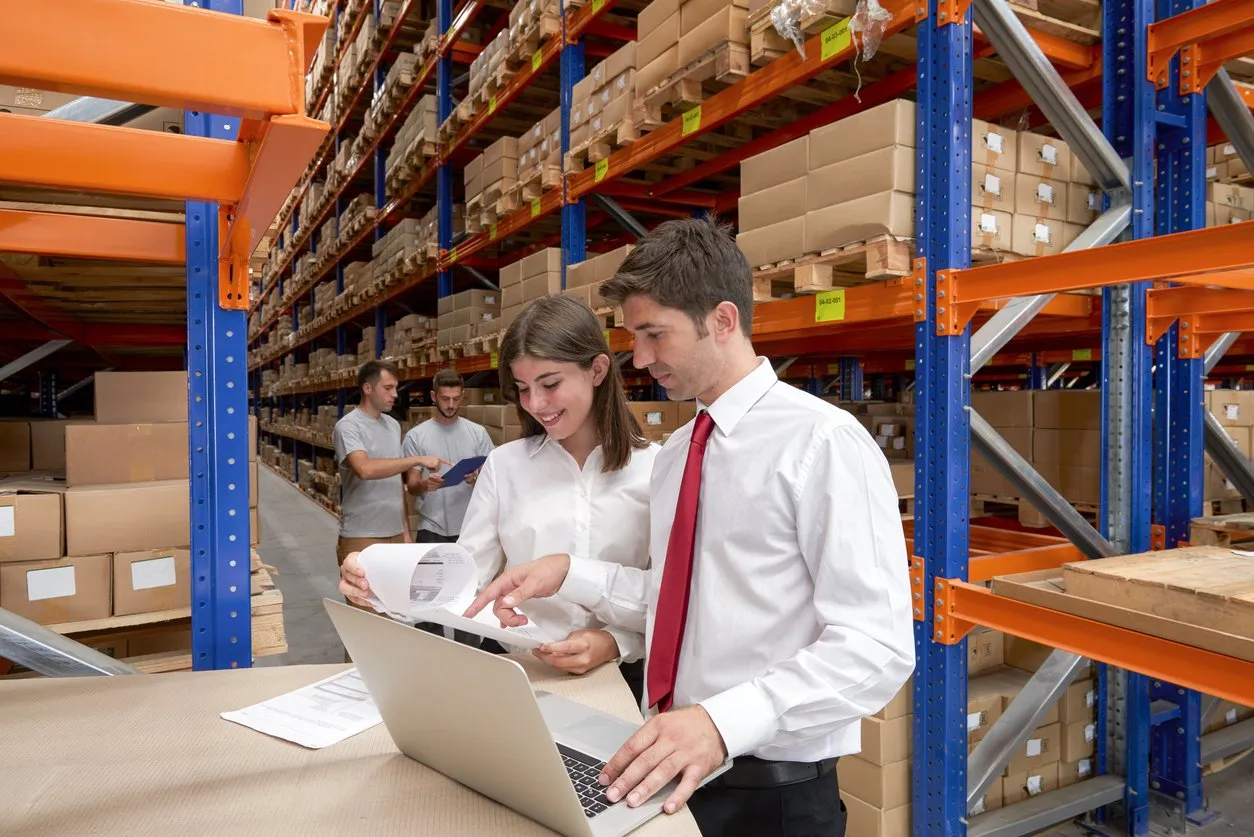 Business owner moving boxes into a commercial storage unit in Melbourne